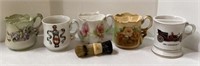 A lot of five mustache mugs - three with floral