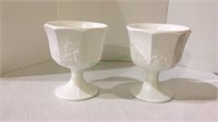 Set of two milk glass pedestal flower arranging