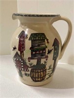 Large birdhouse themed pottery pitcher measuring