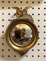 Small eagle pole mirror is 8 inches tall and 5