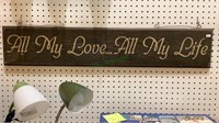 Long wooden hanging sign which says all my love