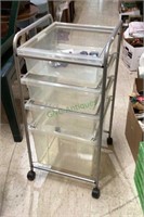Four drawer lift out storage rack on caster