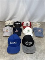 Assortment of golf branded hats