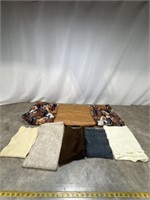 Assortment of scarves and horse pattern blanket