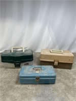 Assortment of fishing tackle boxes and tackle
