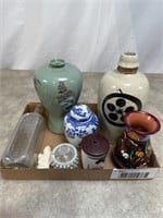 Assortment of vases, glass bottle, and jars with