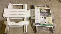 Two outdoor tables - one is new in packaging and