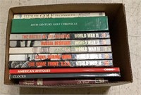 Box of books includes titles about golf, World
