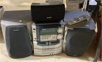 AIWA brand digital audio system with three