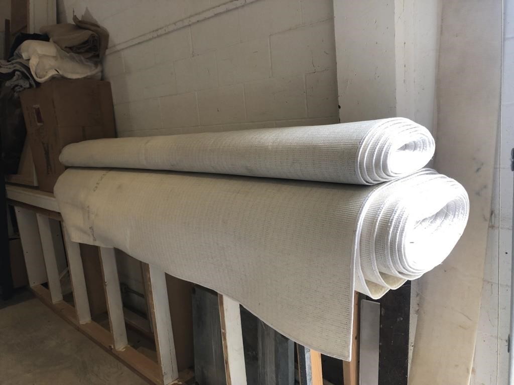 2 rolls of white bound edge carpet