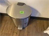 Stainless steel  trashcan with foot pedal lid.