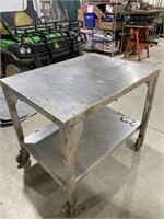 Stainless steel rolling table 41” wide 36” tall