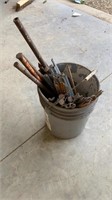 Bucket of concrete stakes