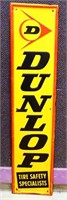 Vntg 60x13.75 metal embossed Dunlop Tires sign