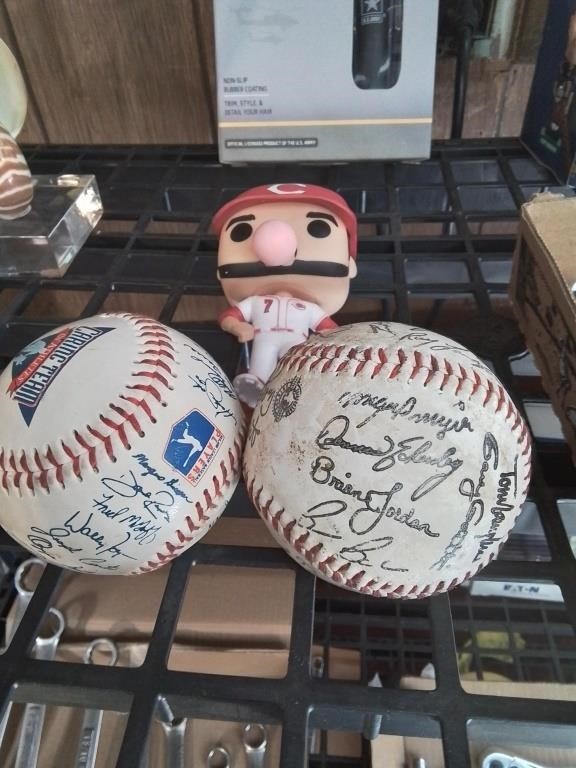 2 signed baseball's and a sports figure