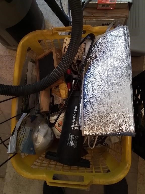 Yellow laundry basket of miscellaneous hardware