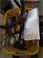 Yellow laundry basket of miscellaneous hardware