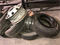 6 USED TIRES AND 2 RIMS