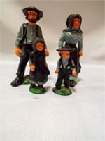 Vintage small Iron Amish Family of four Figurines