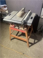 Working 10 inch Skil tablesaw on stand