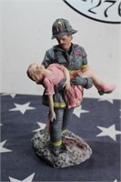 Ceramic Fireman Figurines- Fireman Holds Girl