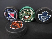LOT OF 4 NHL HOCKEY PUCKS