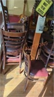 16 restraunt style chairs in rough condition