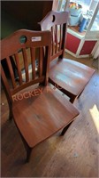 Pair of wooden restaurant chairs