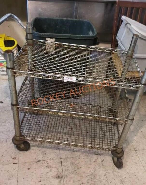 small metal wire rack on wheels