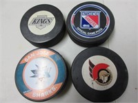 LOT OF 4 NHL HOCKEY PUCKS