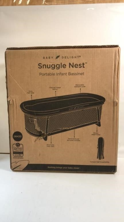 New Snuggle Nest Portable Infant Bassinet