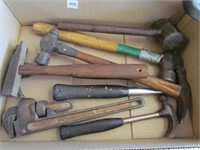 assorted hammers, pipe wrench