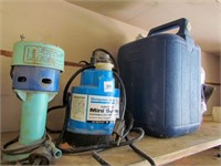 2- sump pumps, water jug, degreaser