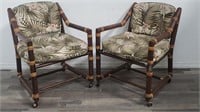 Pair of vintage floral arm chairs on casters
