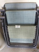 2 Green Reclining Chairs