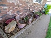 North flowerbed items, pots, garden statues