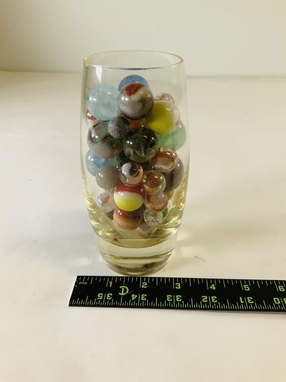 Glass Cup Full of vintage marbles