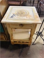 Decorative carved end table
