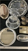 Various metal serving dishes and trays