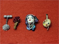 Assortment of Vintage Broaches.