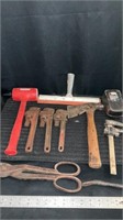 Weighted hammer, pipe wrenches, hachet, squeegee,