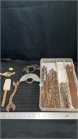 Assorted bits, guards, vintage wrench