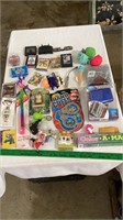 Asssorted kids toys, playing cards, nic nacks,