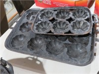 2 CAST IRON MUFFIN PANS