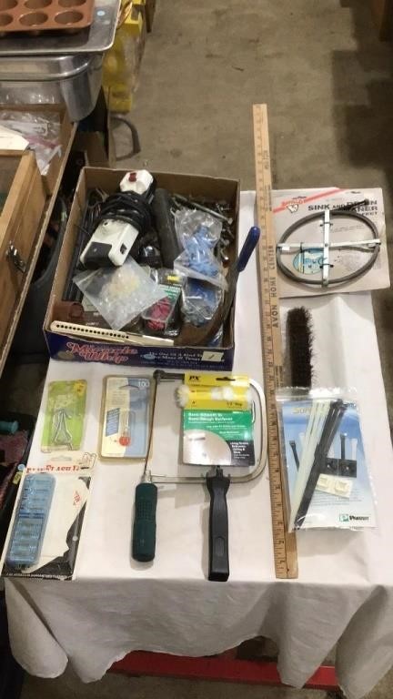 Sink and drain cleaner, wire brush, saw, paint