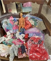 Ken Barbie and bunches of Barbie clothes