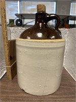 11" tall Whiskey jug with crack and chips