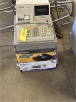 2 cash registers and microwave