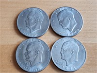 Four Eisenhower Dollars