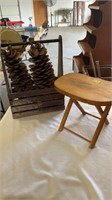 Large decorative pine cones , stool